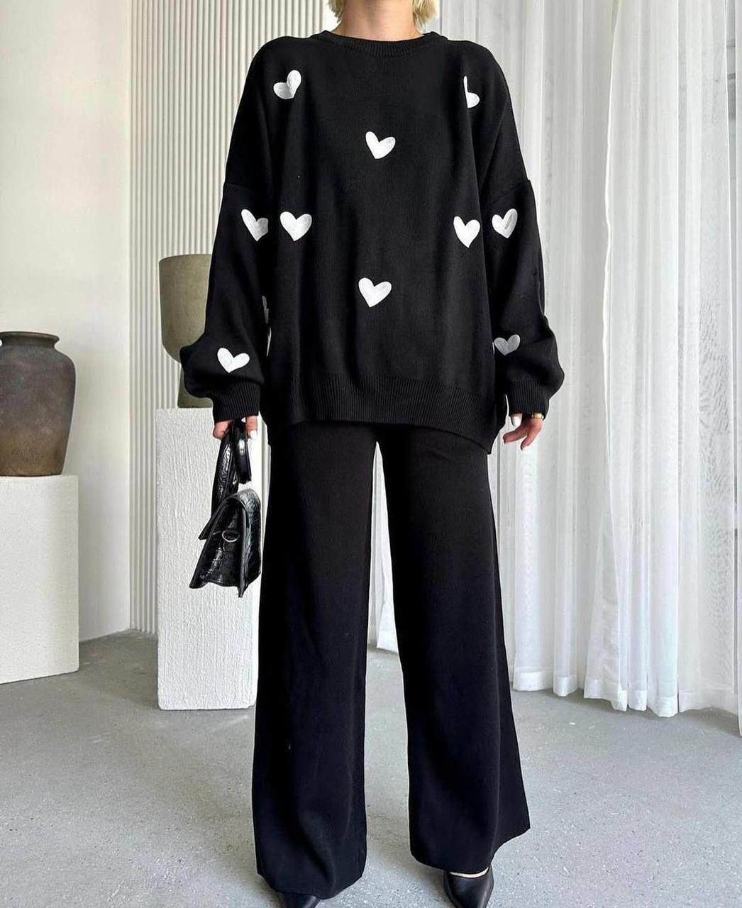 black tracksuit with (white hearts)