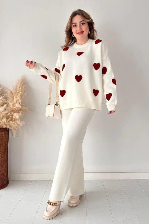 white tracksuit with (maroon hearts)
