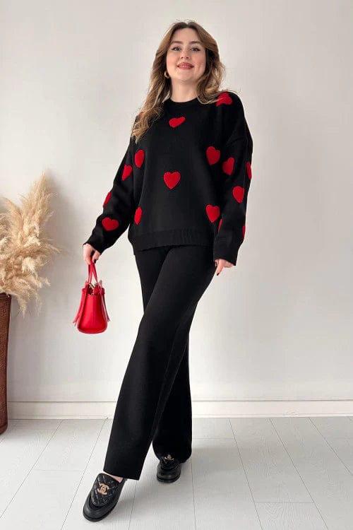black tracksuit with (red hearts all over)