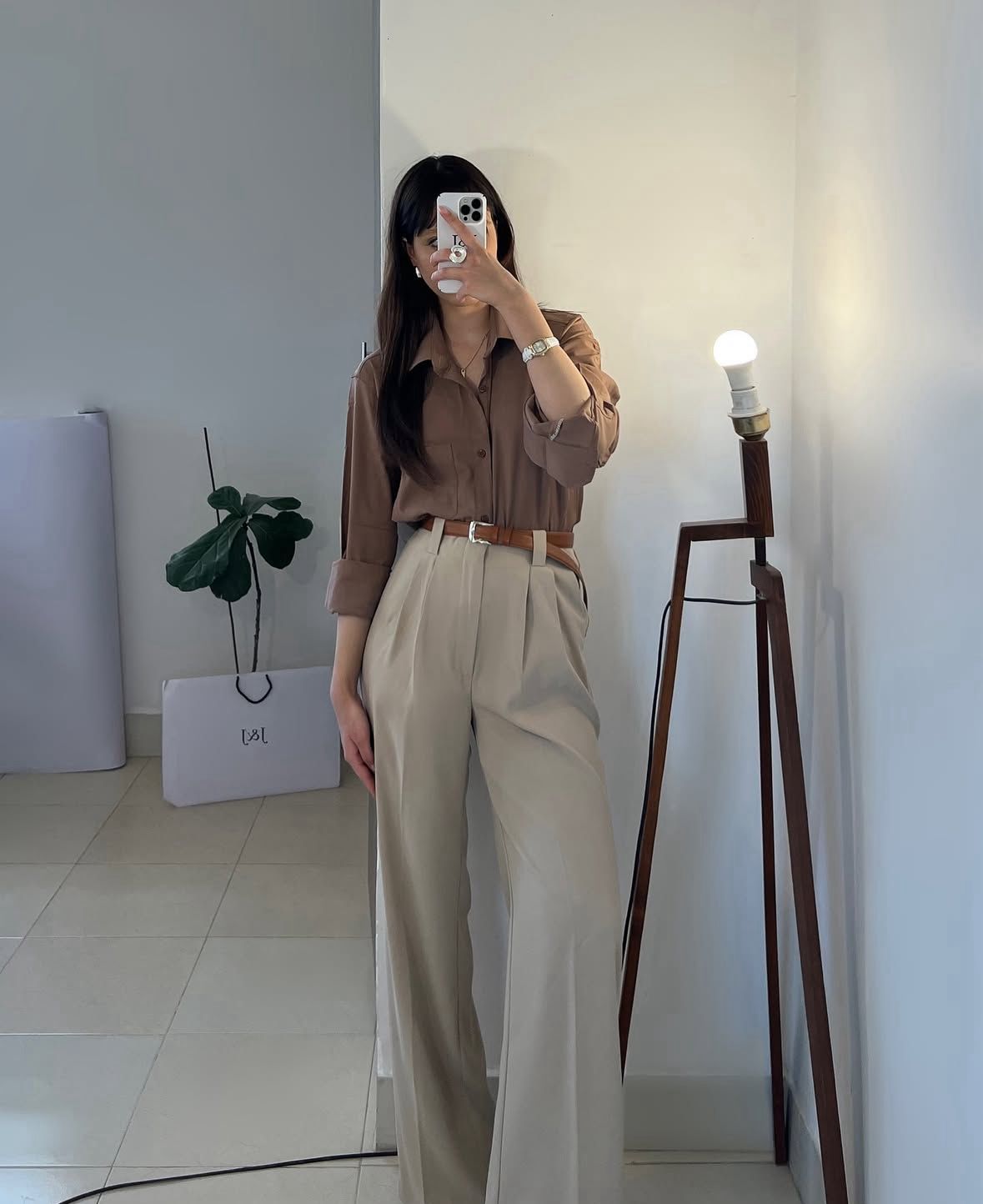 beige formal pants with brown button down shirt