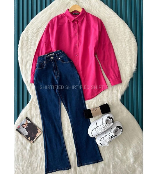 hot pink utton down shirt with darkblue bell bottom jeans