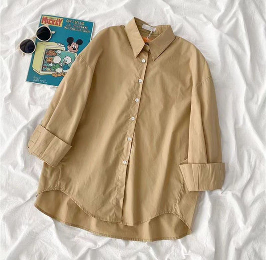 beige button down shirt