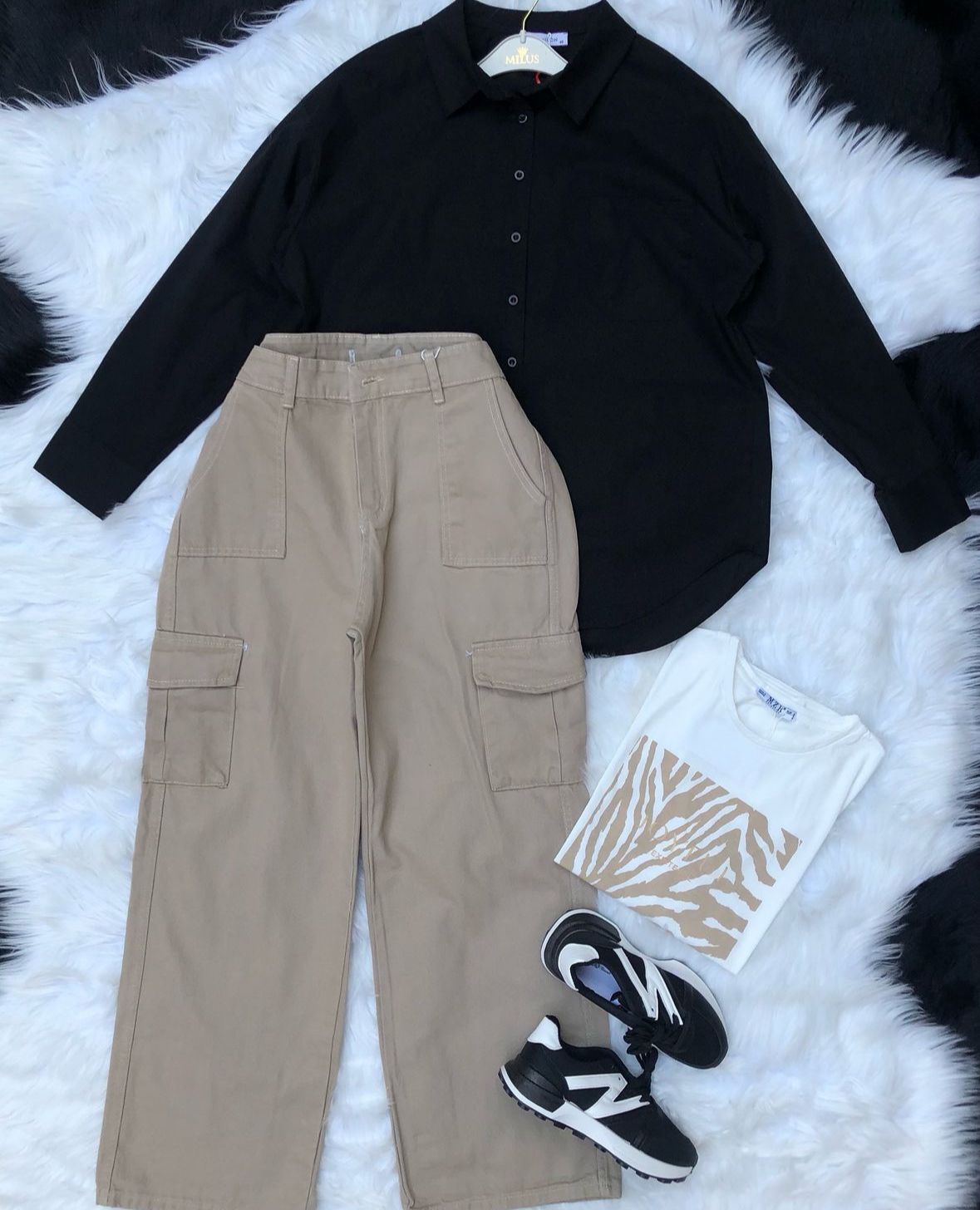 beige wideleg cargo pants with black button down shirt
